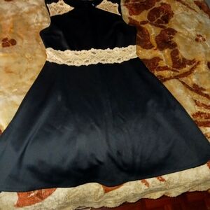 Black mini dress with tan laced waist